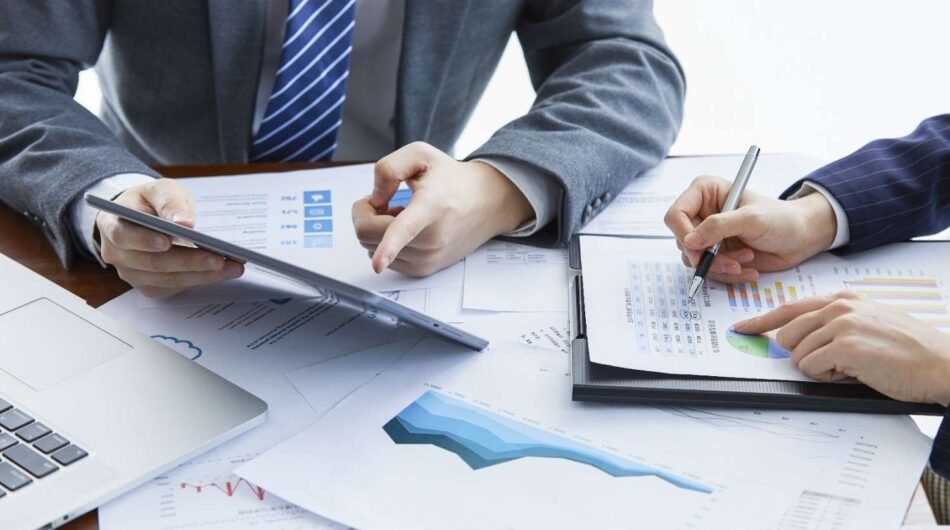 businessmen-elegant-suits-business-meeting-discussing-new-project-office