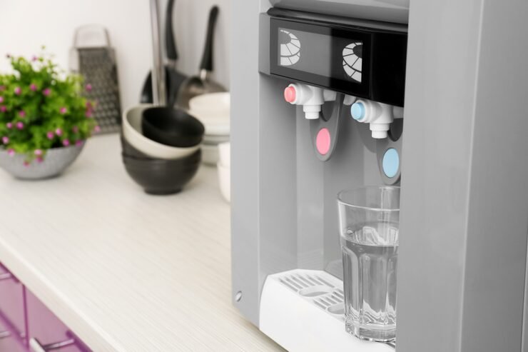 modern-water-cooler-with-glass-kitchen-table_392895-13471