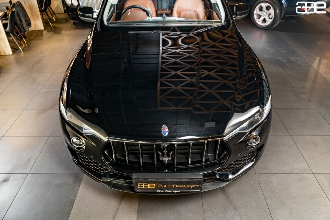 How Pre-Owned Luxury Cars in Black Deliver Superior Road Presence and Prestige