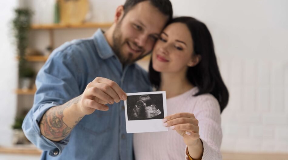 medium-shot-couple-holding-ultrasound-min-scaled-1