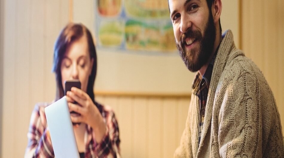 couple-using-laptop-mobile-phon-1