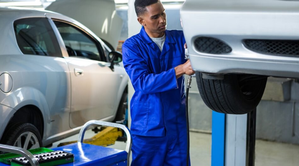 mechanic-fixing-car-tyre-1