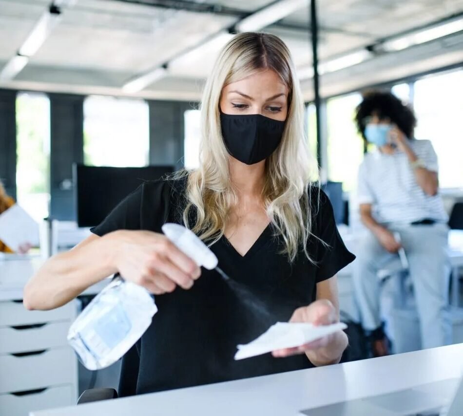 imgi_3_young-woman-with-face-mask-back-at-work-in-office-2CMYZKV-scaled-1-1280×854-1