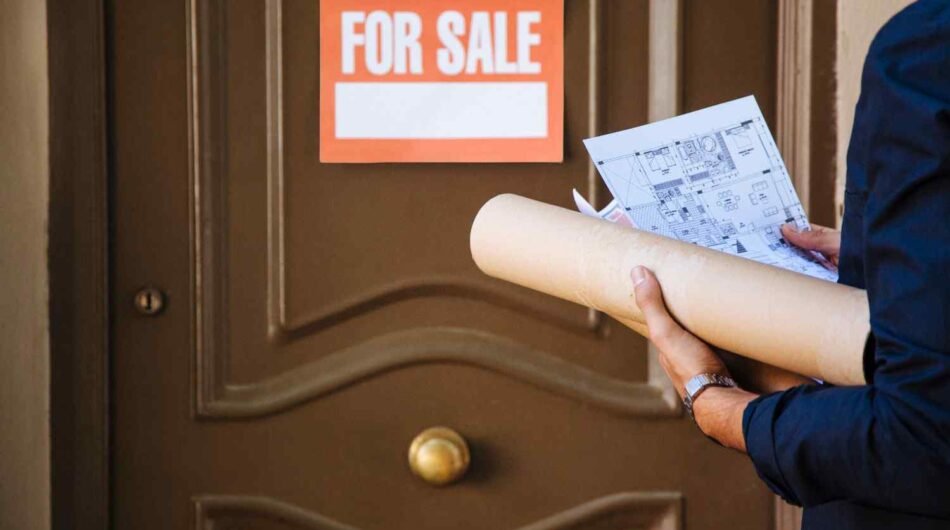 real-estate-agent-front-door-with-sale-sign