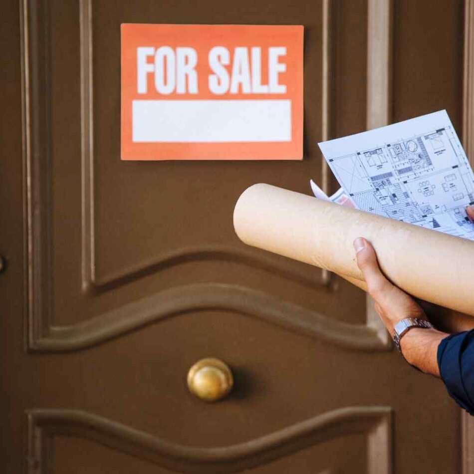 real-estate-agent-front-door-with-sale-sign
